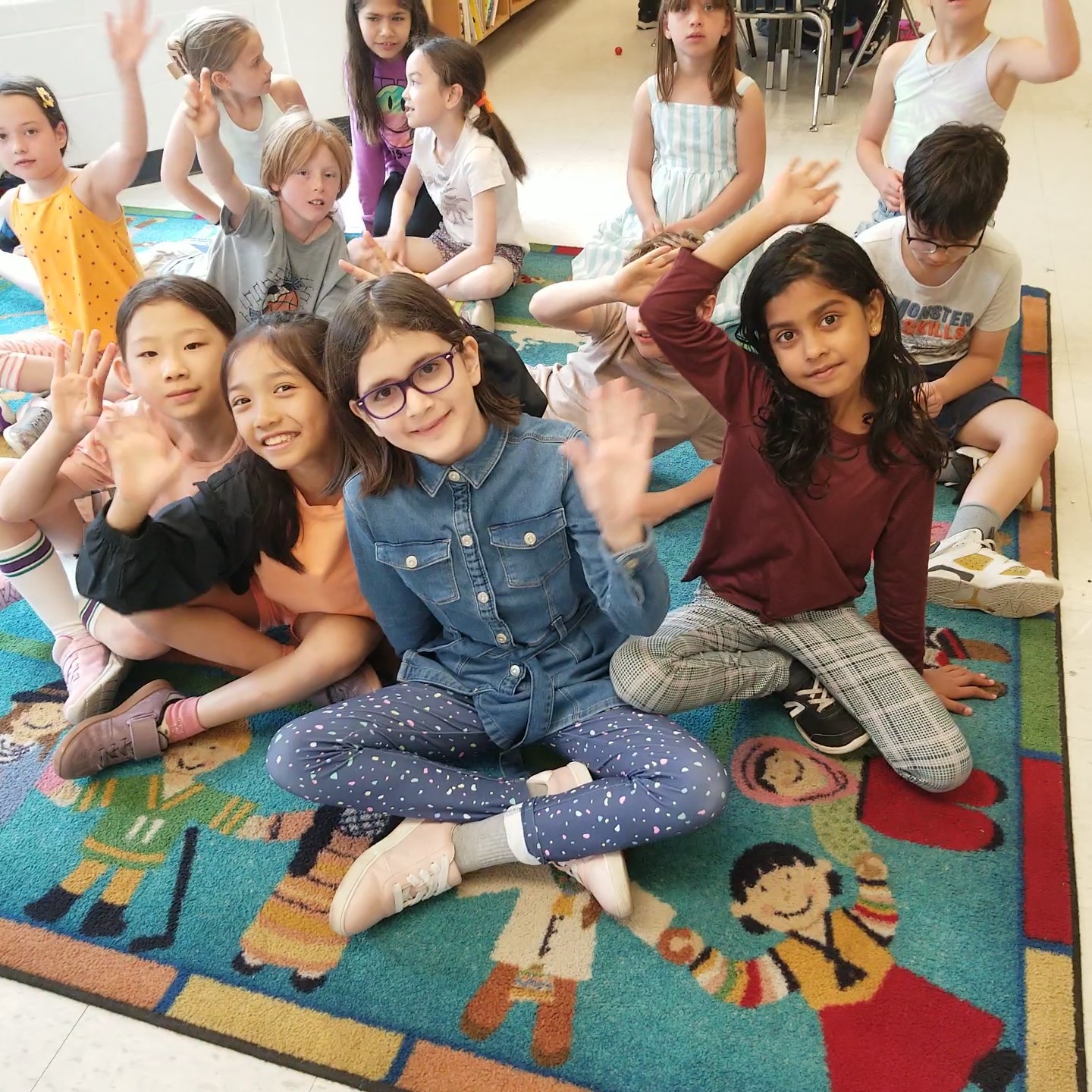 children on sitting on a carpet