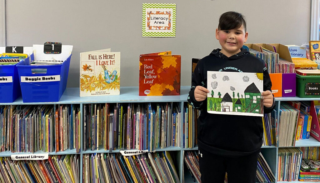 1536x880-young-boy-with-his-drawing