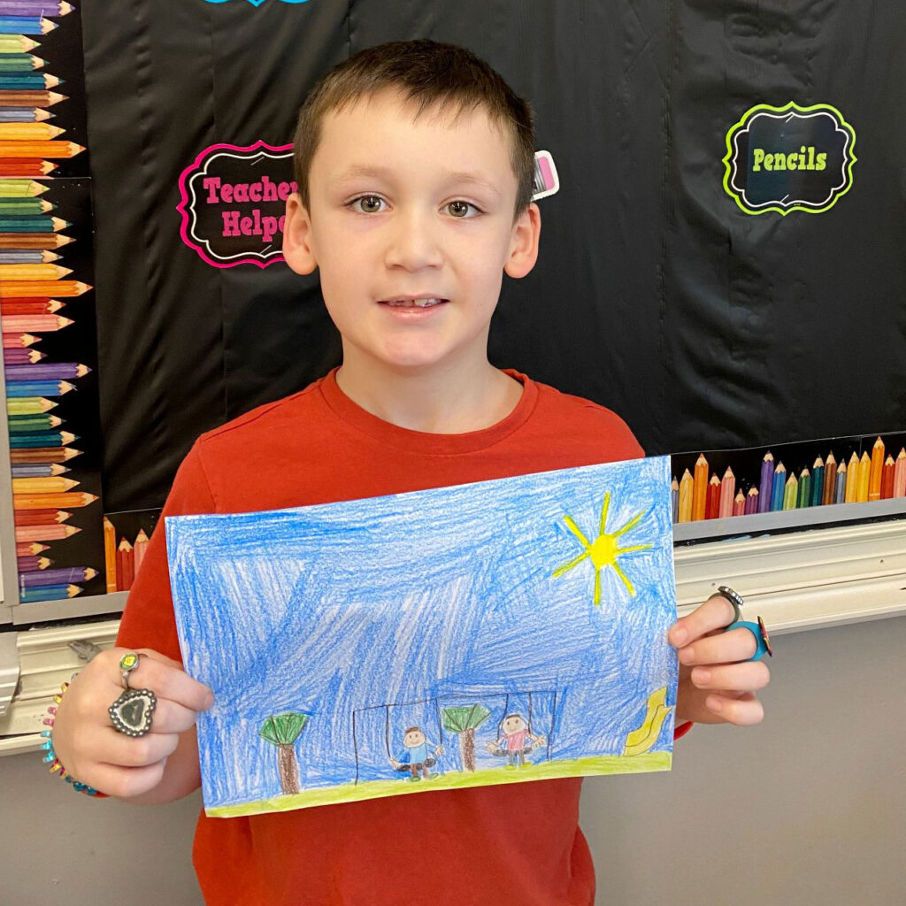 1x1-young-boy-with-his-crayon-drawing
